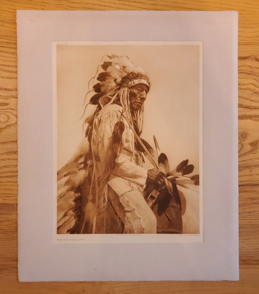 Edward S. Curtis - A Complete Portfolio XIX - Vintage Photogravure - Portfolio, 18 x 22 inches - Portfolio IX from Edward S. Curtis, "The North American Indian" contains 36 photogravures. In this particular portfolio the images are printed on Deluxe Japanese Tissue paper. The tribes included are: Wichita, Washita, Cheyenne, Arapaho, Oto, Osage, Hunta Wakunta, and Comanche <br> <br> Edward Curtis photographed most of the images in this portfolio around 1927 and it is available at this time in our Aspen Art Gallery.