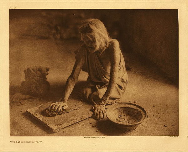 Edward S. Curtis - Plate 419 The Potter Mixing Clay - Vintage Photogravure - 18 x 22 inches