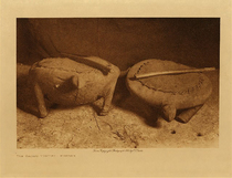Edward S. Curtis - *50% OFF OPPORTUNITY* The Sacred Turtles - Mandan, Vol. V - Vintage Photogravure - Volume, 9.5 x 12.5 inches - The Turtles were found to be made of heavy buffalo skin, and considering the material used are excellently well formed. Their length is about twenty inches, and the weight probably twenty pounds each. The priests claim for these Turtle drums freat weight because each contains a spirit buffalo, a belief which they carefully keep alive in the minds of the people by pretending to exert great strength in handling them.
