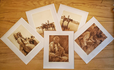Edward S. Curtis - A Complete Portfolio XIX - Vintage Photogravure - Portfolio, 18 x 22 inches - Portfolio IX from Edward S. Curtis, "The North American Indian" contains 36 photogravures. In this particular portfolio the images are printed on Deluxe Japanese Tissue paper. The tribes included are: Wichita, Washita, Cheyenne, Arapaho, Oto, Osage, Hunta Wakunta, and Comanche  
<br>
<br> Edward Curtis photographed most of the images in this portfolio around 1927 and it is available at this time in our Aspen Art Gallery.