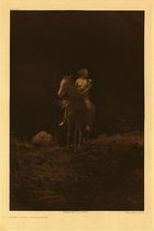 Edward S. Curtis - Plate 260 Night Scout - Nez Perce - Vintage Photogravure - Portfolio, 18 x 22 inches - Taken at night by photographer Edward S. Curtis this image displays a Nez Perce scout on horseback. Possibly looking for buffalo or more likely looking for approaching enemies. The subtle details of his moccasins and the grasses stand out against the darkness of the piece. Printed by Edward S. Curtis in 1910 on Dutch Van Gelder paper. The pieces is available for sale at our Aspen Art Gallery.