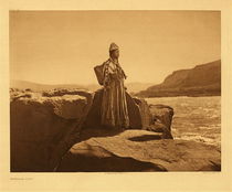 Edward S. Curtis - *50% OFF OPPORTUNITY* Plate 284 Wishham Maid - Vintage Photogravure - Portfolio, 18 x 22 inches - “Clad in her deerskin dress of the plains and her basketry hat of the coast, the girl pauses on the grim lava rocks above the Dalles, looking out across the thundering rapids, perhaps observing the activities after friends in the village Wasko.” – Edward Curtis
<br>
<br>As far as the Oregon coast, the practical construction of the prairie tribes is once again found incorporated into the dress of the Wishham.