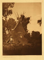 Edward S. Curtis - Plate 141 Apsaroke Medicine Tipi - Vintage Photogravure - Portfolio, 22 x 18 inches - 	The Apsaroke medicine-men usually painted their lodges according to the visions received while fasting and supplicating their spirits. This tipi was painted dark red, with various symbols on the covering. No man would dare so to decorate a tipi without having received his instructions in revelation from the spirits.