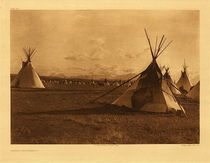 Edward S. Curtis - Plate 207 Piegan Encampment - Vintage Photogravure - Portfolio: 18 x 22 inches - The camp was a combined one of the Piegan and many visitors from the Piegan of the north, the bloods, and the Blackfeet, in all some 230 lodges. If this poor remnant of a once so powerful tribe proved such an awe inspiring sight, what must it have been at the height of their existence! Red Plume describes the camp of his people when he was a youth as a circle a mile or more in diameter and in some places sixteen lodges deep. To have such a vast camp would have been worth long privation and hardship
<br>
<br>Their lodges of buffalo skins and later of canvas, were of common tipi form. The testimony of the old men is that they used skin lodges while still in the forest, but this would seem doubtful, particularly as to their winter habitations. They likely begun gradually to use them as they moved southward on their hunting expeditions. The one distinctive feature of Piegan lodges is the characteristic decoration of the inner lining. They, like other Indians, often painted their lodges, so as to indicate either the coups of the owner or his medicine, or sometimes both.