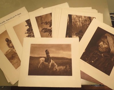 Edward S. Curtis - A Complete Portfolio III - Vintage Photogravure - Portfolio, 18 x 22 inches - COMPLETE PORTFOLIO III (1908): 
<br>Tribes: Teton Sioux, Yanktonai and Assiniboin.
<br>
<br>This complete portfolio consists of 35 large-format hand-pressed photogravures, paper type: Japon Vellum, with original title page list, and an original large folio case: The images were loose as issued in the original brown ¾ morocco portfolio with flaps and ties. 
<br> 
<br>“The North American Indian” took 16 years longer to complete than projected, and exceeded its budget by nearly $1.4 million.  A complete set is valued at $1.8 to $2.6 today. Curtis’ project won support from such prominent and powerful figures as President Theodore Roosevelt and J. P. Morgan.
<br> 
<br>Curtis’ work stands a monumental photo-ethnographic publishing project and an unrivaled masterpiece of visual anthropology. His images remain indelible in the American consciousness.