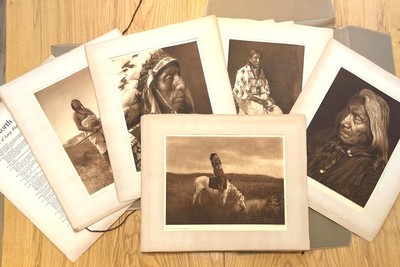 Edward S. Curtis - Complete Portfolio III - Tribes: Teton Sioux, Yanktonai and Assiniboin - Vintage Photogravure - Portfolio, 1 3/4 x 23 1/2 x 19 1/2 inches - Edward Curtis (1868-1952)
<br>COMPLETE PORTFOLIO III ~ “The North American Indian”
<br>
<br>Includes images such as:
<br>“Plate 103 Red Cloud”    
<br>“Plate 80 An Oasis in the Badlands”        
<br>“Plate 84 Slow Bull”
<br>
<br>COMPLETE PORTFOLIO III (1907): A rare opportunity to acquire a complete portfolio. The complete portfolio we are offering consists of 36 large-format hand-pressed photogravures, paper type: Deluxe Japanese Tissue, with original title page list, and an original large folio case: The images were loose as issued in the original brown ¾ Morocco portfolio with flaps and ties. 
<br>
<br>Tribes included in the portfolio: Teton Sioux, Yanktonai and Assiniboin 
<br>
<br>Provenance: 
<br>Library of the University of Oregon
<br>Private collector: Private Collector, MI. – Owned by the collector from 1980 to present. 
<br>
<br>“The North American Indian” took 16 years longer to complete than projected and exceeded its budget by nearly $1.4 million.  A complete set is valued at $1.8 to $3.5 today. Curtis’ project won support from such prominent and powerful figures as President Theodore Roosevelt and J. P. Morgan.
<br>
<br>We have two complete portfolios at this time. To my knowledge they are the only complete portfolios on the market at this time. Complete portfolios are very rare these days.
<br> 
<br>Curtis’ work stands a monumental photo-ethnographic publishing project and an unrivaled masterpiece of visual anthropology. His images remain indelible in the American consciousness.
<br>
<br>Here is a link to a documentary about Edward Curtis. It is fabulous. 
<br>Https://www.makepeaceproductions.com/coming-to-light.html - If you haven’t watched this yet I would recommend taking the time, truly fascinating.