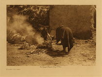 Edward S. Curtis - *50% OFF OPPORTUNITY* Firing Pottery - Vintage Photogravure - Volume, 9.5 x 12.5 inches - This photogravure by Edward S. Curtis was taken in 1922 and displays the act of firing pottery by the Hopi women. Usually fired using sheep’s dung after being dried for many days in a small fire pictured here. This photogravure was taken by Edward S. Curtis for his volume XII and is printed on Dutch Van Gelder paper. This piece is available for sale in our Aspen Art Gallery.