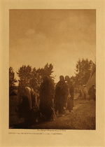 Edward S. Curtis - *50% OFF OPPORTUNITY* Departure From Preparation Lodge - Cheyenne - Vintage Photogravure - Volume, 12.5 x 9.5 inches - The sweat lodge ceremony was very important to the Cheyenne tribes. This image taken by Edward S. Curtis depicts a number of Cheyenne in robes departing from one of the sweat lodges likely for ceremonial purposes. The image was printed for The North American Indian volume VI on Dutch Van Gelder paper. Printed in 1909 by photographer Edward S. Curtis, this piece is now available for sale in our Aspen Art Gallery.