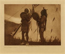 Edward S. Curtis -   Singing Deeds of Valor - Sioux - Vintage Photogravure - Volume, 9.5 x 12.5 inches - "A 'coup' could be won by actually killing an enemy, by striking the body of an enemy whether dead or alive, by capturing a horse or a band of horses, or by taking a scalp. Honors were counted on each hostile warrior by the first four who struck him, the first in each case winning the greatest renown, an honor called 'taya-kte' (kill right). Thus if twenty men were struck or even touched in an encounter, twenty honors of the first grade were won by the victors. But the greatest exploit of all was to ride in the midst of the enemy and strike a warrior in action without attempting to wound him. When a man had lead four war parties, and in each achieved a first honor, he was eligible to chiefmanship." by Edward S. Curtis in "The North American Indian", Volume III
<br>
<br>Provenance: Original Subscription Set #59. George D. Barron, Rye, NY
