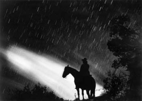 Barbara Van Cleve - Star Shower - Silver Gelatin Photograph - 17 3/4 x 23 1/4 inches - Artist Statement: <br> <br>Photography is the means by which my spirit permeates the image I record on film. Hopefully, the viewer will share some of my enthusiasm, excitement, amazement and curiosity, as well as in a vicarious sense, the atmospheric conditions when I make the photograph. The composition and lighting of the image, as well as the arrangement of the lighter and darker areas, help to reinforce those elements of the shade experience of the revelation. The grain of the film is an important part of the image as it helps to accentuate the dust, rain, snow and the atmospheric conditions when the photograph was made.