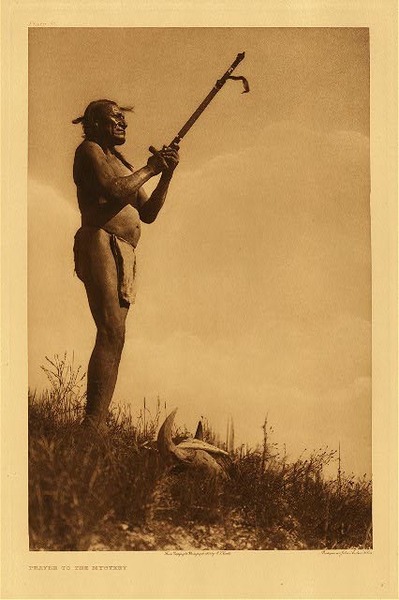 Edward S. Curtis - Plate 091 Prayer to the Mystery border=