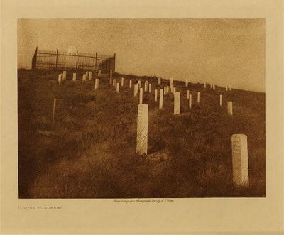 Edward S. Curtis -   Custer Monument - Vintage Photogravure - Volume, 9.5 x 12.5 inches - After the Custer battle Congress as well as the military authorities awakened to the seriousness of conditions among the Lakota. On August 15, 1876, an act was passed for the appointment of a new commission, and on August 24, the personnel was made up as follows: George W. Manypenny, Henry C. Bullis, Newton Edmunds, Bishop Henry B. Whipple, A.G. Boone, A.S. Gaylord, General H.H. Sibley, and Dr. J.W. Daniels. They prepared a treaty in advance, the main object was to secure the cession of the Black Hills. Many concessions and advantages were promised and an effort was to be made to move the Lakota into Indian Territory. In violation of the Laramie treaty of 1868, no effort was made to obtain the consent of three-fourths of the adult males; but instead the treaty was first presented to the friendly Spotted Tail and his leaders, and then to the headman of the other bands separately. By the end of October all of the Lakota except the irreconcilable bands of Gall and Sitting Bull had signed. The Indian Territory project was abandoned, and after discussing other localities without results the bands settled down to a prosaic existence on the reservations where their survivors are still living.<br><br>Provenance: <br>Art Institute of Chicago, Ryerson & Burnham Library