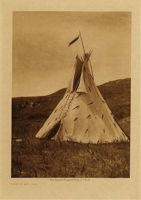 Edward S. Curtis -   Slow Bull's Tipi - Sioux - Vintage Photogravure - Volume, 12.5 x 9.5 inches - Slow Bull was born 1844. First war-party at fourteen, under Red Cloud, against Apsaroke.  Engaged in fifty-five battles with Apsaroke, Shoshoni, Ute, Pawnee, Blackfeet, and Kutenai.  Struck seven first coups.  At seventeen he captured one hundred and seventy horses from Apsaroke.  In the same year he received medicine from buffalo in a dream while he slept on a hilltop, not fasting, but resting from travel on the war- path.  Counted two honors in one fight, when the Lakota charged an Apsaroke camp and were routed.  Slow Bull returned to the enemy; his horse stepped in a hole and fell, and an Apsaroke leaped on him.  He threw his antagonist off, jumped on his horse, and struck his enemy in the face with a bow.  At that moment another Apsaroke dashed up and dealt him a glancing blow in the back with a hatchet. Slow Bull counted coup on him also. He has been a subchief of the Ogalala since 1878.<br><br>Provenance: <br>Art Institute of Chicago, Ryerson & Burnham Library