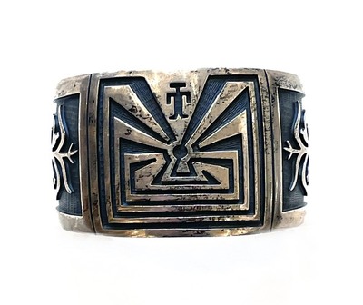  Title: Bracelet: Man w/ Maze and Cornstalk Sides , Size: 6 1/4 x 1 1/2 inches , Medium: Sterling Silver